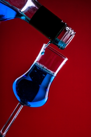 Pouring Blue Martini Curacao Cocktailの写真素材