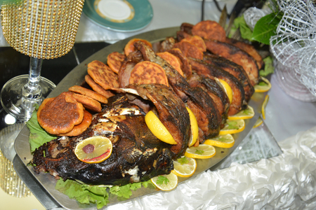 baked carp with vegetablesの写真素材