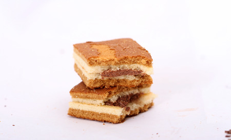 Sweet yellow cake, chocolate and bikeの写真素材