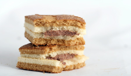 Sweet yellow cake, chocolate and bikeの写真素材