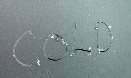 text cold on frozen windowの写真素材