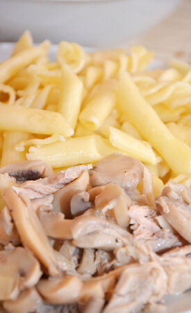 Chicken with mushrooms and pastaの写真素材