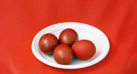 red easter eggs on redの写真素材
