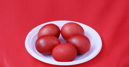 red easter eggs on redの写真素材