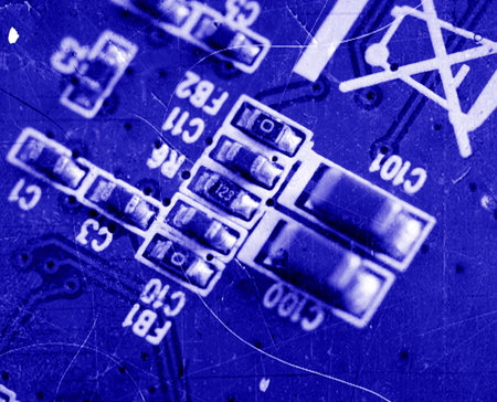 Blue circuit board, solderings and pathsの写真素材