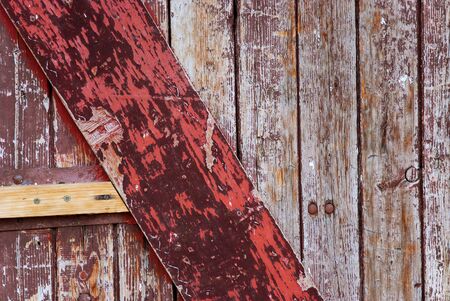 Picture of an  Old    wooden door with peeled paintの写真素材