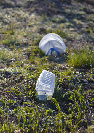 Picture of a Plastic pollution, Plastic pet bottles in a grassの写真素材