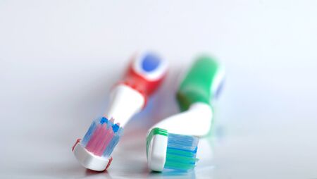 close-up blue  and red tooth brush,picture of aの写真素材
