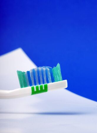 close-up blue  and red tooth brush,picture of aの写真素材
