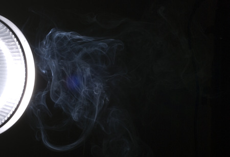 Picture of a Studio flash on black backgroundの写真素材