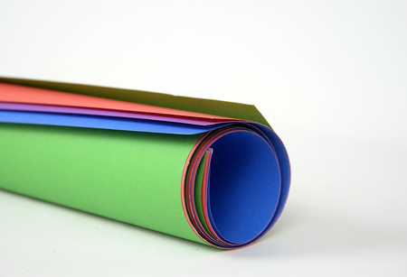 picture of a tube  made of various color paperの写真素材
