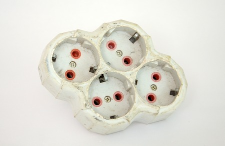 Electrical quadruple white plastic power socket , picture of a
