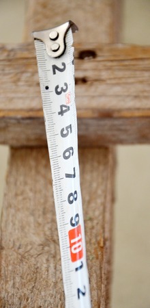 Picture of a White measure tape on blurred backgroundの写真素材