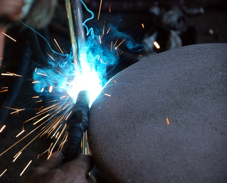 picture of a process of welding. sparks and heatの写真素材