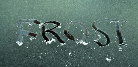 picture of a frost surface with hand writen  text frostの写真素材