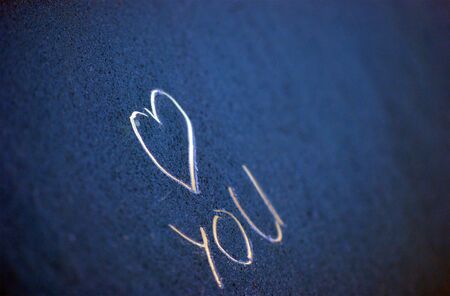 I love you text on a morning frost on car windosの写真素材