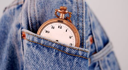 Picture of a blue jeans denim texture and vintage pocket watchの写真素材