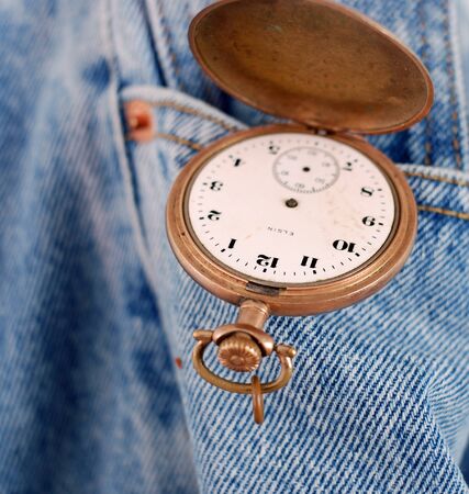 Picture of a blue jeans denim texture and vintage pocket watchの写真素材