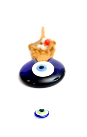 picture of a evil eye stone on a white background,の写真素材