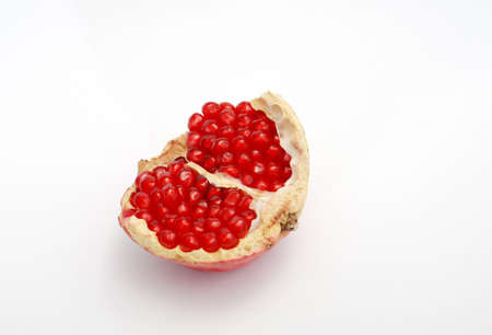 picture of a pomegranate fruit on a white backgroundの写真素材