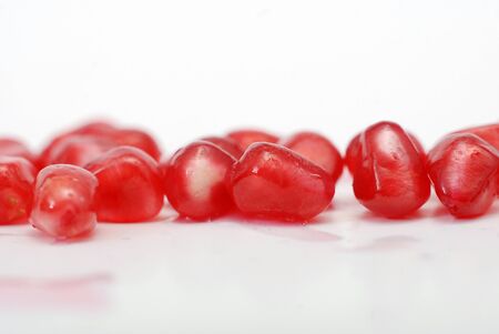 picture of a pomegranate fruit on a white backgroundの写真素材