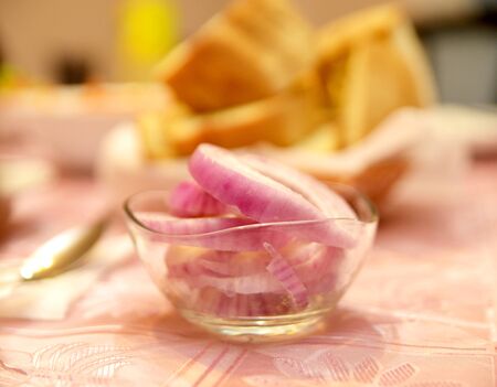 Picture of a Slices of an onion in glass bowlの写真素材