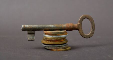 Picture of a an Old rusty key. Security conceptの写真素材