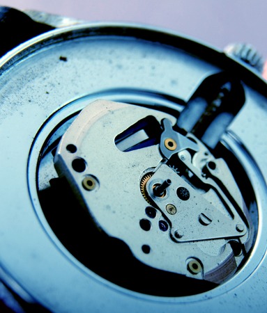 macro picture of a wrist watch clock mechanism
