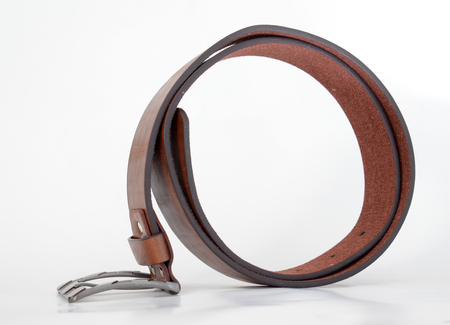 Picture of a Brown leather men belt on whiteの写真素材