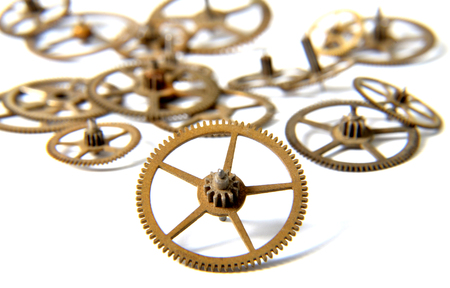 Picture of an Old Clock gears on a white backgroundの写真素材
