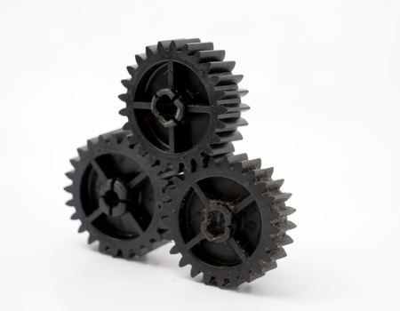 picture of a black old plastic dirty cogwheelの写真素材