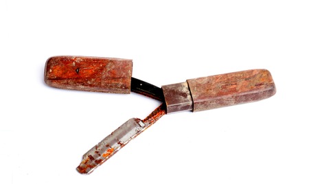 picture of an old rusty damaged razor