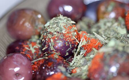 Green olives & oil isolated on a whiteの写真素材