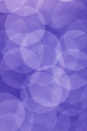 Defocused Bokeh twinkling lights Vintage background. Festive background with natural bokeh and bright lights.の写真素材