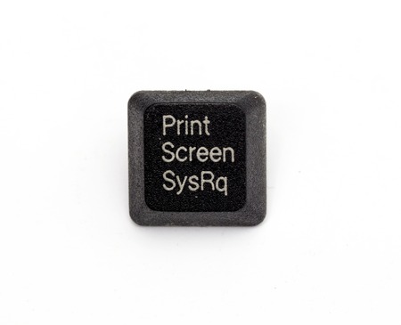 picture of a dirty key from a computer keyboard isolated on a white