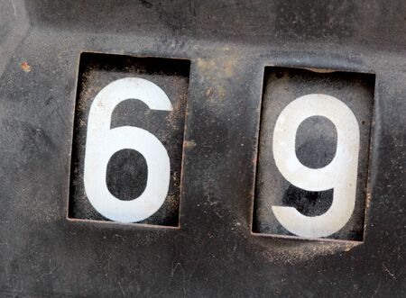 Picture of a Old rusty counter on gasoline out damaged pumpの写真素材
