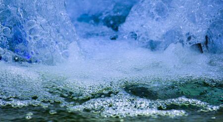 many bubbles in water close upの写真素材