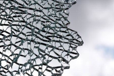 pucture of a Broken bus window inside from accident