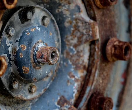 picture of a details close upof and old rusty truck wheelの写真素材