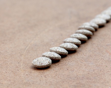 picture of a . Medicine Herbal pills , alternative drug. Natural pharmaceutical pill, . Vitamin supplement for care, medication, treatment.wood background,shallow dofの写真素材