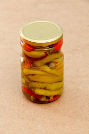picture of a Pickled chilli paprika in jar ready for winterの写真素材