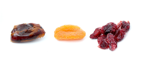 picture of a dried apricots, canberries and dates isolatedの写真素材