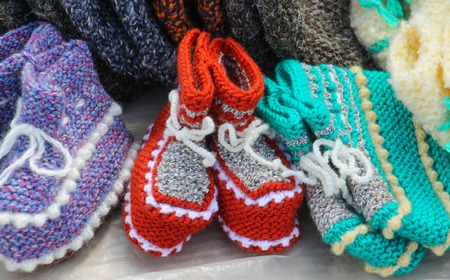 picture of a handmade knitted baby wool socks for saleの写真素材