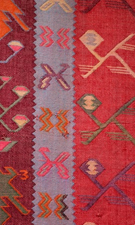 picture of a coooful macedonian hand made traditional woolen rugs. color concept