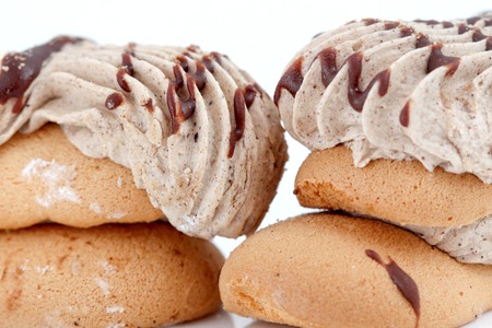 picture of a cake pieces of chocolate and vanilla filling.