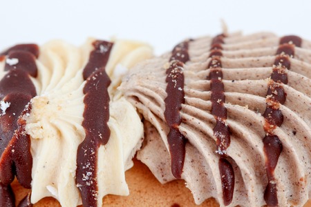 picture of a cake pieces of chocolate and vanilla filling.の写真素材