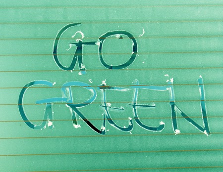 picture of a Handwritten text Go Green on a Frosted Glass Texture.Green effect addedの写真素材