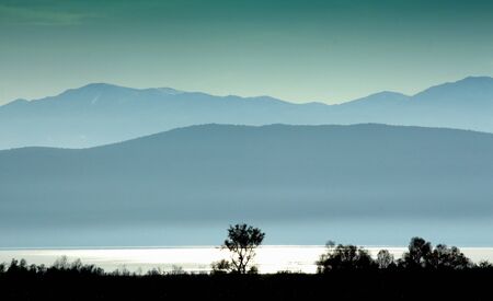 picture of a sunset on a lake prespa in macedoniaの写真素材