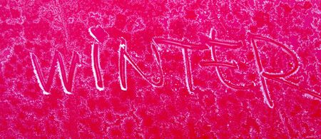 picture of a text winter on a frosty red metal surfaceの写真素材