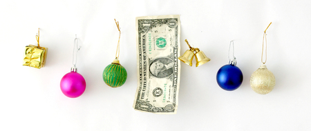picture of an one dollar with christmas decoration elementsの写真素材
